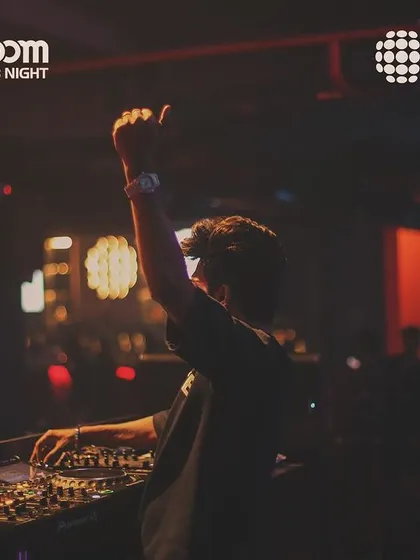 A silhouette shot from behind the decks at Sunburn Union.