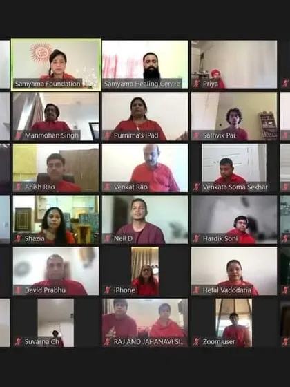 Participants from our virtual workshop on prosperity, all focused during a meditation session. This image, a duplicate of ID 10, reinforces the deep engagement and shared experience of our online community.