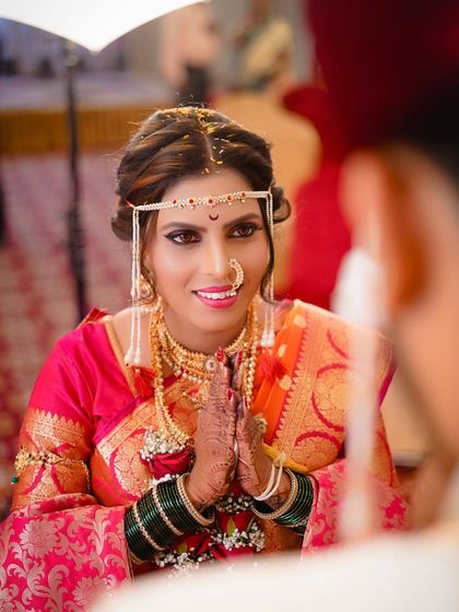 The bride's expression of reverence and joy as she greets her groom with a 'namaste'. This is a key emotional moment that I always focus on capturing.