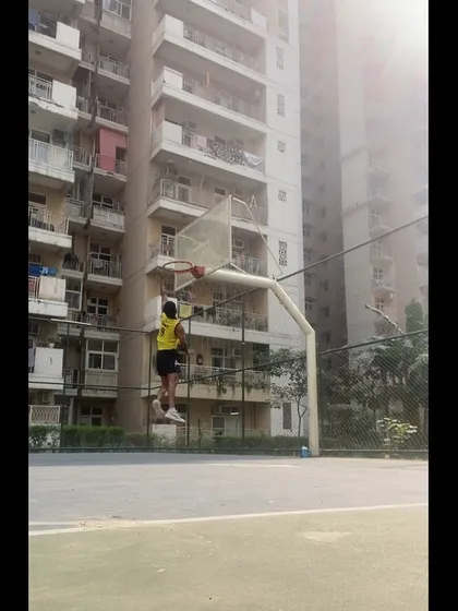 A young player executing a layup with good form. Seeing them apply what they learn in drills is the goal of my coaching.