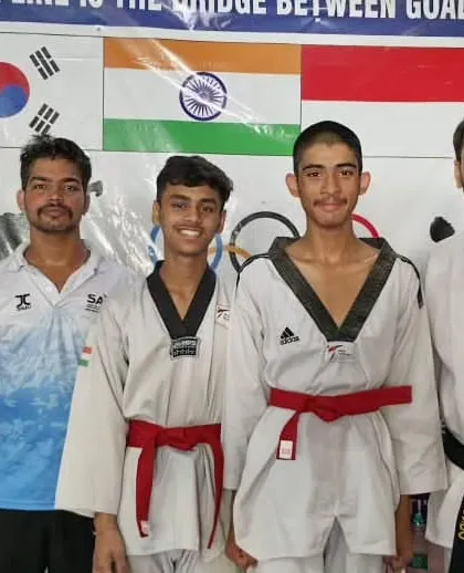 Our red belt students, who are now senior members of the academy and mentors to the junior belts.