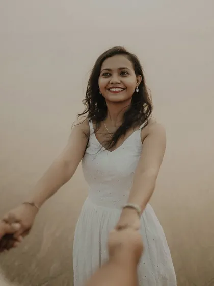Your hand in mine is my favorite place to be. A beautiful point-of-view shot that makes you feel like you're part of their love story during this beach pre-wedding session.
