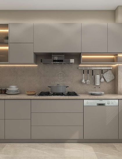 The kitchen from our 'Nivasa' project, designed for simplicity and longevity. The neutral grey cabinets, simple hardware, and clean lines create a timeless and highly functional workspace.