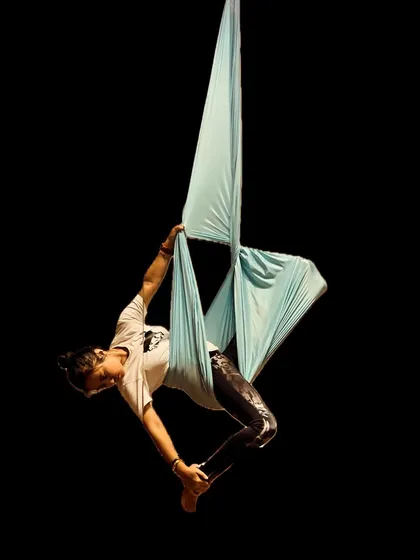 My newest love with the fabric. This artistic shot captures a moment of quiet connection and grace, highlighting the beauty of the human form interacting with the silk.