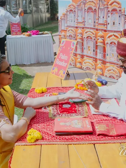 Adding mystical elements like a palm reader is a fantastic way to engage guests. It provides a unique and personal experience that they will talk about long after the wedding.