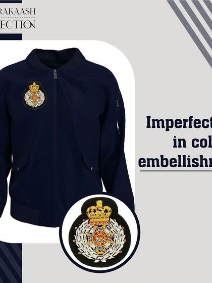 A navy blue bomber jacket styled with a large, ornate crest patch. This is a great example of how our hand-embroidered patches can be used to add a personalized, high-fashion element to casual wear.