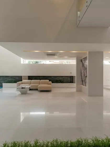 The guest level of the neeti residence, where the living space opens directly to an indoor pool, blurring the line between inside and out…