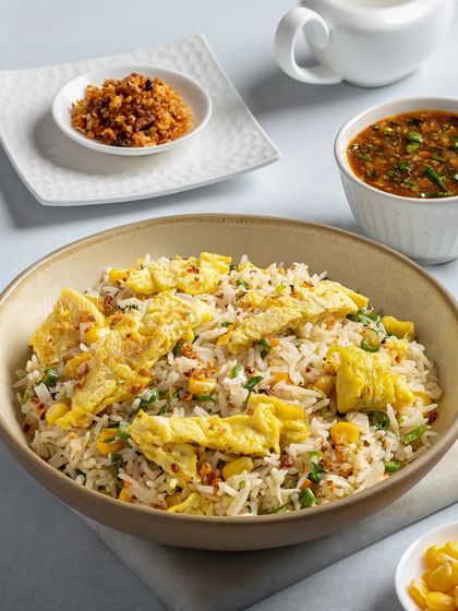 A bowl of egg fried rice, a simple yet universally loved dish.