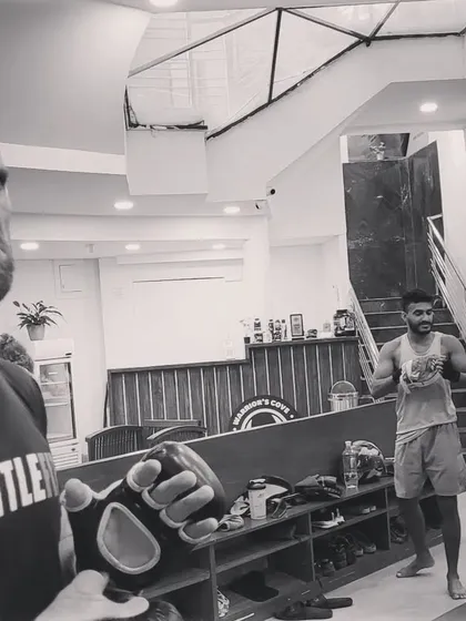 The intensity of a fighter getting ready for battle. This is the culmination of months of hard work and dedication from the whole team.