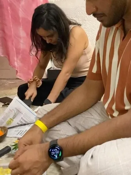Participants deeply engaged in their craft during a flower pounding session. The quiet focus in the room is always a sign that people are truly connecting with the creative process.
