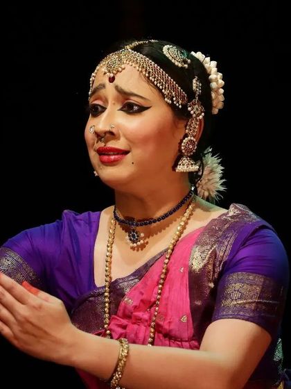 The subtle art of abhinaya. Here, a dancer communicates a feeling of gentle persuasion or offering, a key element in narrative dance pieces.