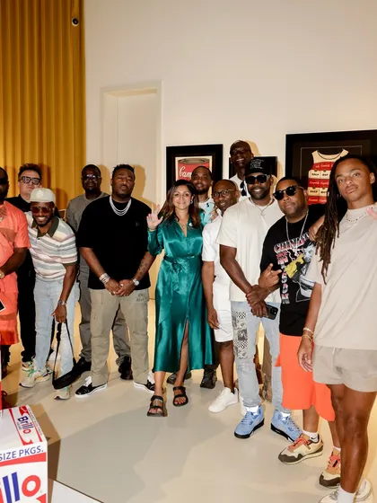 The team and special guests, including Poo Bear and London on da Track, gathered at the exhibition. It's a testament to the high-profile nature of the events I'm involved with.