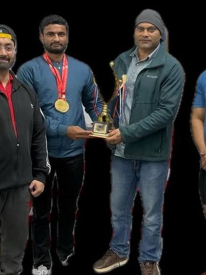 My student Parveen Tomar holding his trophy after being selected for the All Indian Inter Ministry Powerlifting Championship.
