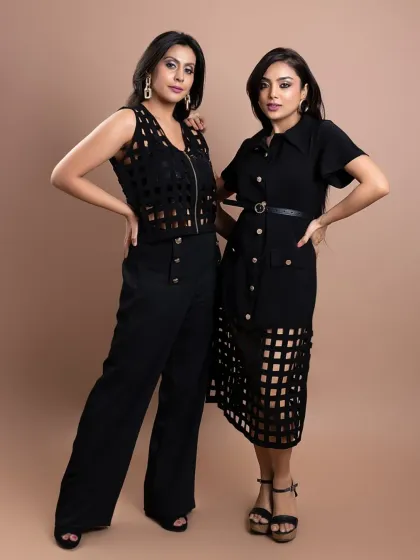 This shot is from a brand photoshoot for a clothing line, showcasing how two distinct outfits can create a cohesive and powerful image together. My focus is on directing models to interact naturally, resulting in lookbook images that feel both stylish and authentic.