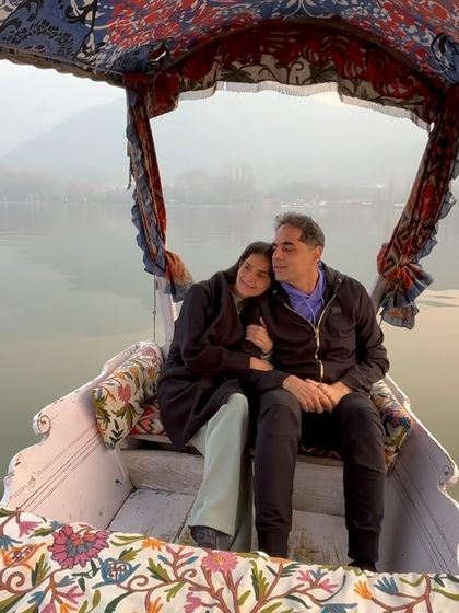 A close-up of us on the Shikara, a cherished memory from our Kashmir trip.