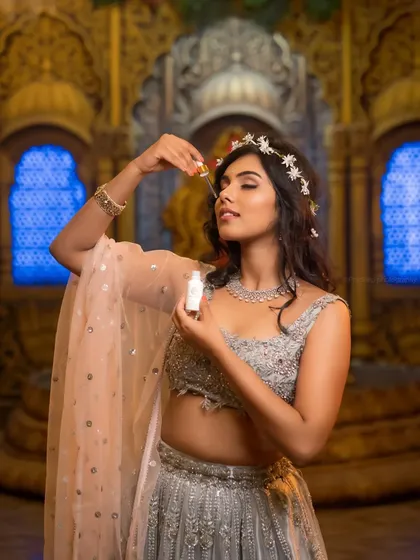 This is a commercial lifestyle shot for the beauty brand Apsaras Beauty. The focus is on creating an ethereal mood that highlights the product, making it perfect for social media campaigns and online stores.