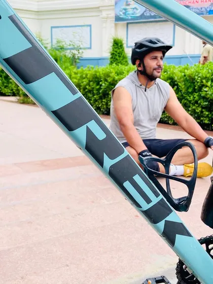 A creative shot focusing on a Trek bike with its rider in the background. We appreciate the beauty of our machines as much as the ride itself.