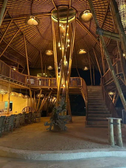 A stunning example of bamboo architecture, where the material is used for everything from the structural columns to the furniture and railings.