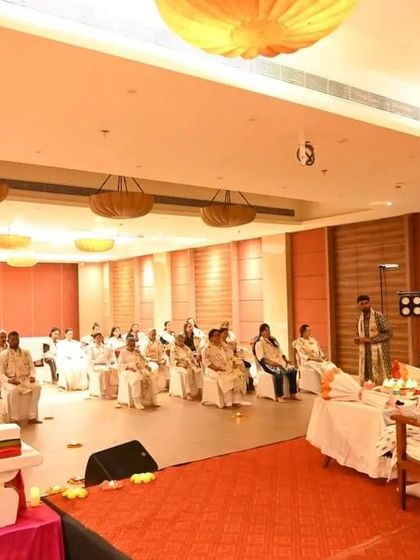 A wide view of a Satsang session in Puri, showing the serene and organized setup for our participants' comfort and focus.
