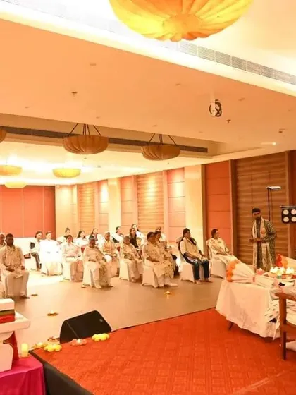 A wide view of a Satsang session in Puri, showing the serene and organized setup for our participants' comfort and focus.