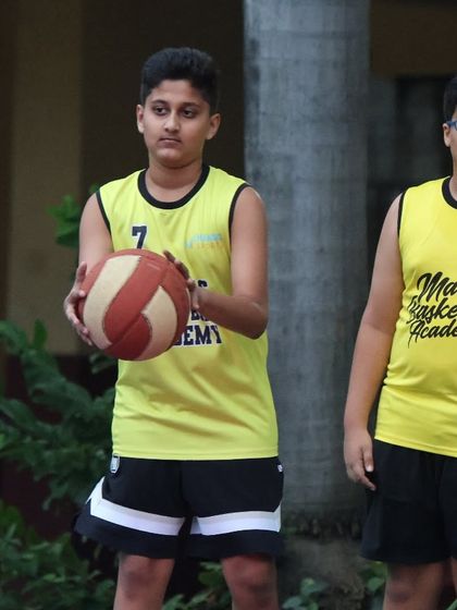 Two players getting ready for a drill. The bond between teammates is built through shared hard work and dedication.