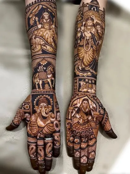 A divine design featuring Lord Ganesha on one palm and a goddess figure on the other, perfect for a spiritual bride.
