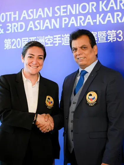Shaking hands after being appointed as the Chairman of the Media Commission of the Asian Karate Federation (AKF). This position allows me to amplify the presence of Asian karate globally.