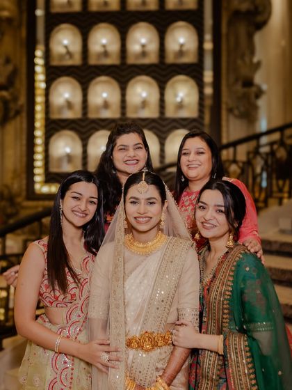 A happy portrait of the bride with her bride tribe!