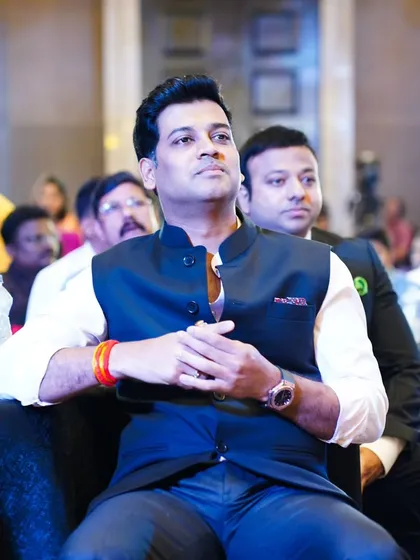 Capturing a candid moment of Dr. Shrikant Shinde during an event. My political and corporate event photography focuses on documenting key figures and attendees in a professional and unobtrusive manner.
