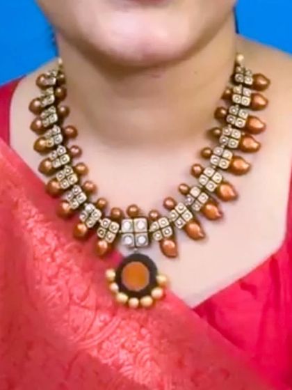 A selfie of me wearing one of my necklaces. It's always a joy to model the pieces I pour so much love into creating.