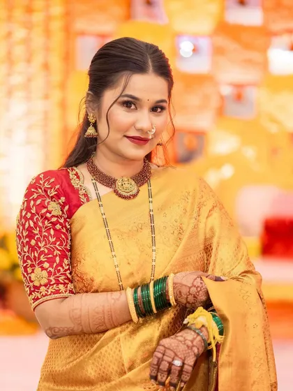 A smiling portrait of the reception bride, looking happy and beautiful.