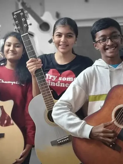 Every picture is worth a thousand words, and this one is worth a million! Our jammers of the day got together for a fun-filled musical evening.