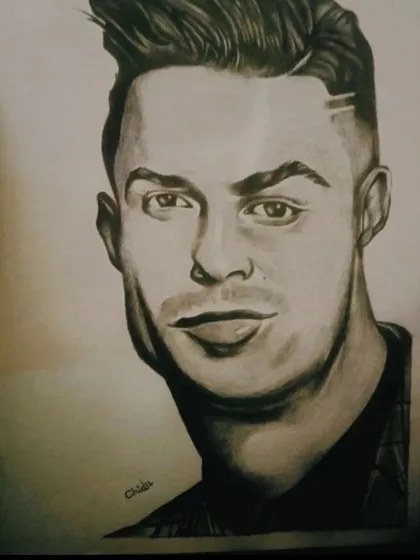 Another pencil portrait of the football icon, CR7. This drawing focuses on a different expression and hairstyle, showcasing my ability to capture various looks of the same person.