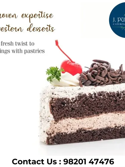 A slice of classic black forest pastry, featuring layers of chocolate sponge, whipped cream, and cherries. It's a timeless dessert option for any celebration.