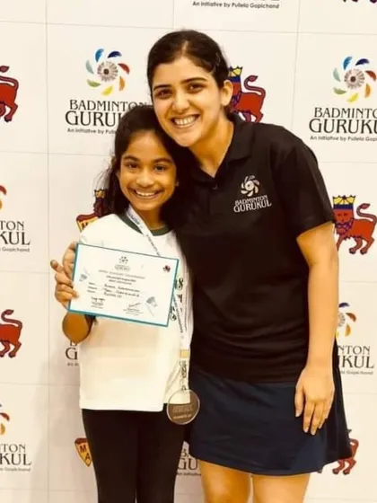 A happy moment as Antara poses with her certificate and medal, a proud achievement for our MCA center student.