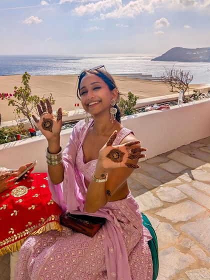 Showing off my Mehendi with a beautiful seaside view. I travel for events and love performing at destination weddings, bringing my dance to beautiful locations around the world.