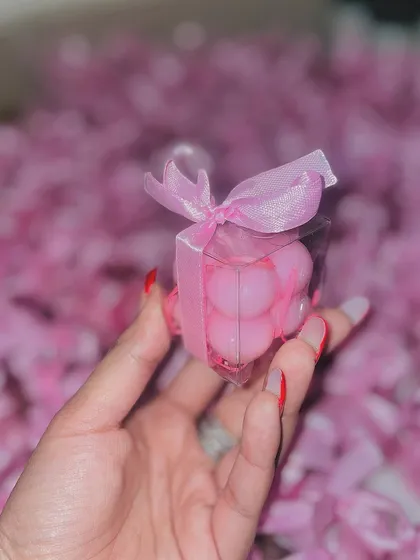 A handful of pink baby bubble candles against a sea of more. They are perfect for giveaways and their small size is unbelievably cute.