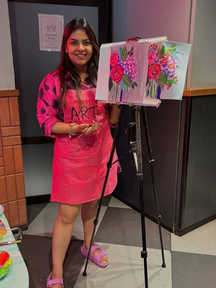 Here I am at my easel during a floral abstract workshop. I love guiding people through the painting process and sharing my passion.