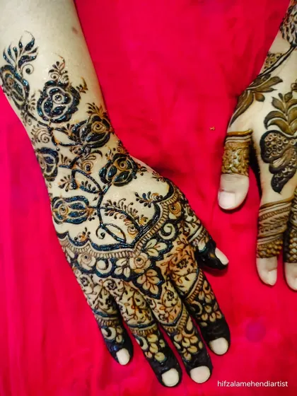 A trendy design featuring bold, dark roses. This style is very popular and creates a beautiful contrast on the skin.