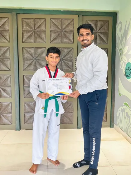 Another proud moment, awarding a certificate to a dedicated student.