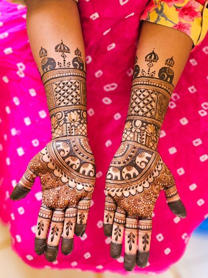 A full view of the symmetrical elephant design on both arms.