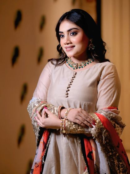 A classic three-quarter portrait of a model in a beautiful ethnic outfit. This is a staple shot for any fashion or portfolio shoot.