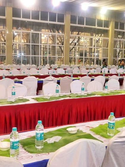 Another perspective of the prepared dining hall, showcasing the scale of the event we are equipped to handle. Every seat is perfectly set for the upcoming feast.