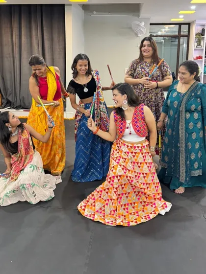 More dandiya fun with the girls. The coordination and rhythm make for a great mental and physical workout.