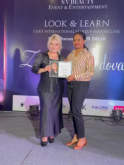 Receiving my international masterclass certificate. Continuous learning is key to staying at the top of this industry.