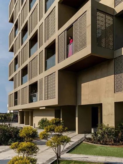 I feature groundbreaking projects like 'SCREEN 504' by Sanjay Puri Architects, a nominee at the World Architecture Festival. This building's perforated screen facade is a brilliant, climate-sensitive response to the heat of Udaipur, showcasing regional context with modern function.