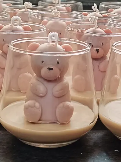 A side view of the teddy bear jar candles.