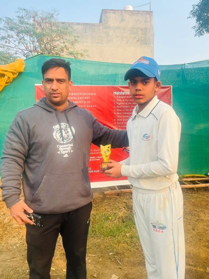 Our player Mohit Vats receiving the best fielder award alongside Tanisha. It's great to see our boys and girls winning awards together.