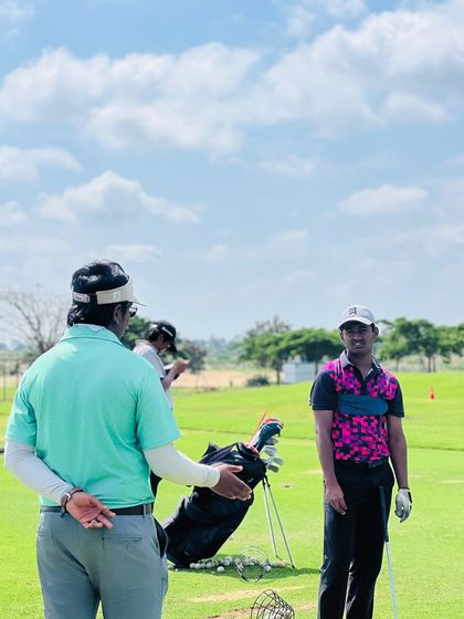 Our coaches are constantly on the range, providing hands-on instruction. From demonstrating a swing path to analyzing a student's setup, these moments of direct mentorship are where real progress is made.