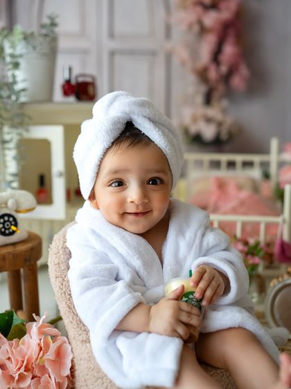 Another adorable spa baby! The white robe and towel wrap are just too cute. This theme always results in the happiest pictures.